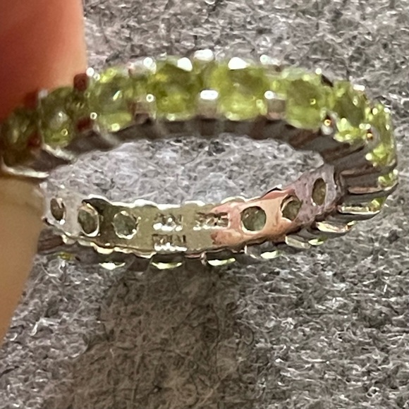 925 Sterling silver eternity ring band, possibly peridot.